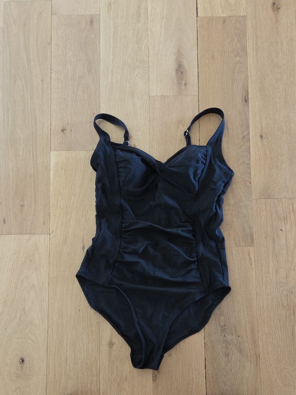 Sleek Black One-Piece Swimsuit with Supportive Cups
